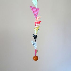 Triangles et perle en tagua